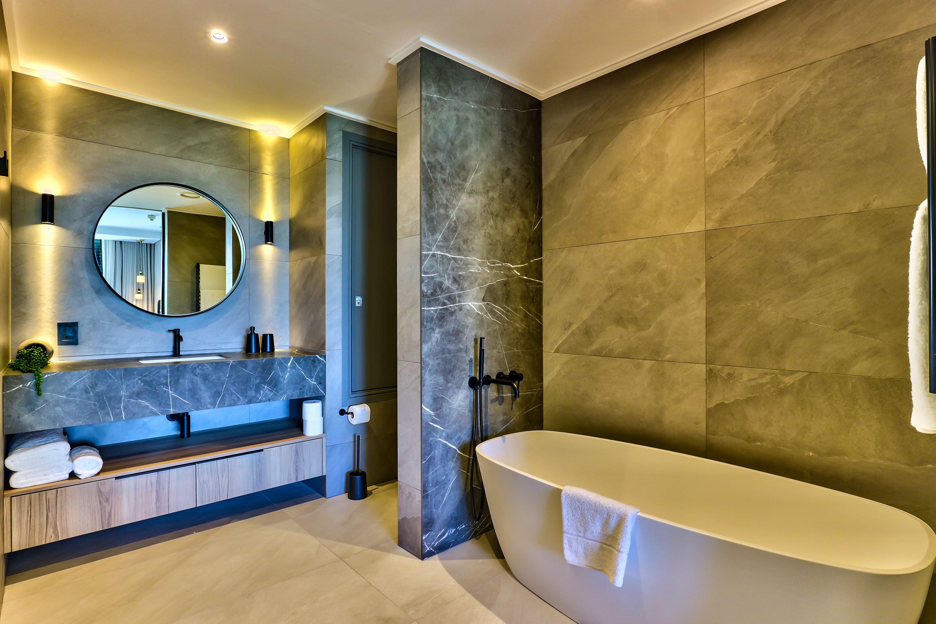 Juliette 211 bathroom with bath and walk-in shower