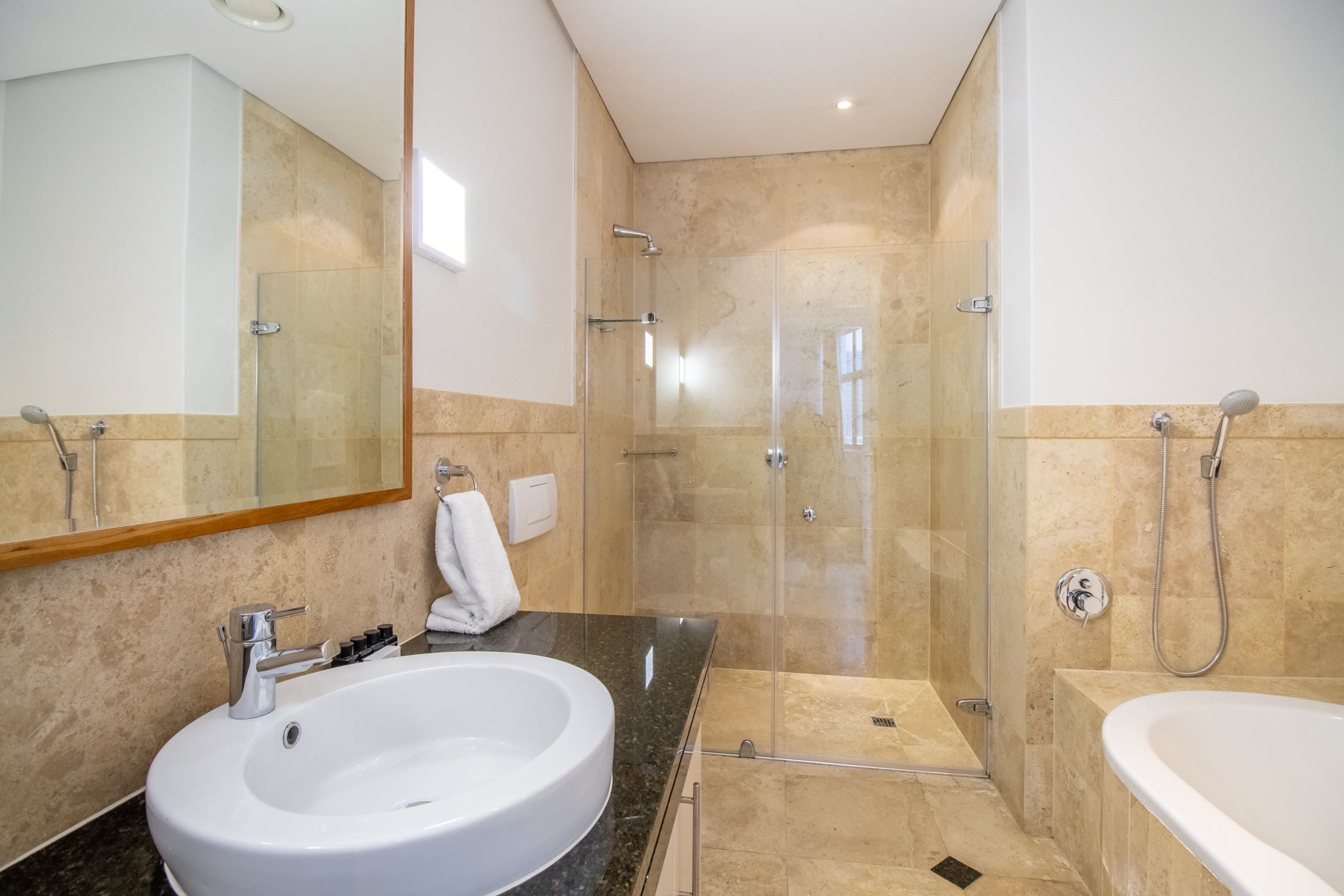 Juliette 603 bathroom with bath and walk-in shower