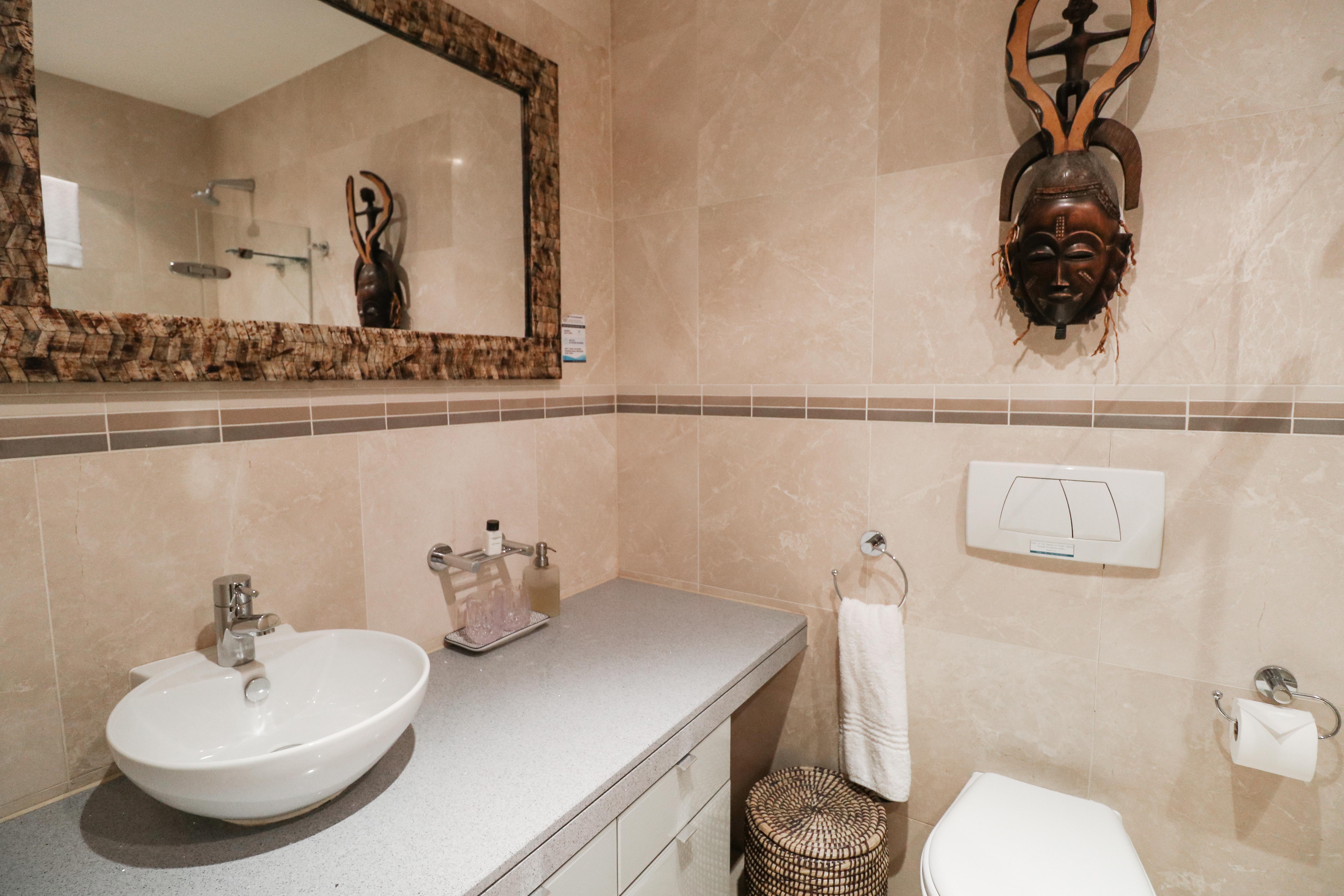 Pembroke 302 bathroom with bath and walk-in shower